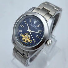Rolex Stunning Blue Sunray Watch with Open Heart Window
